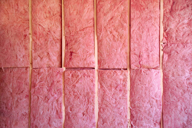 A wall of pink insulation in a new construction